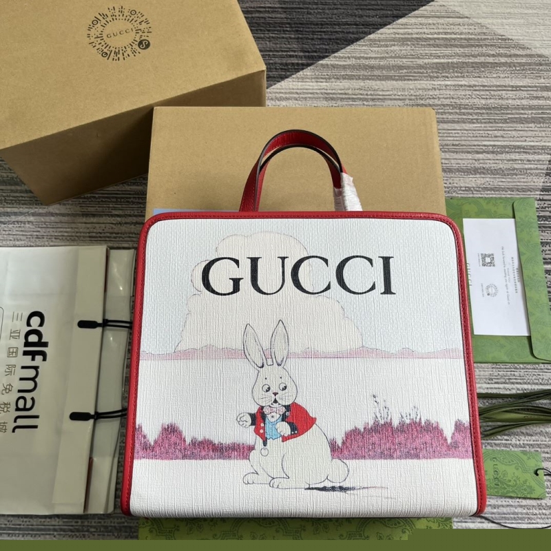 G*u*i shopping bags
